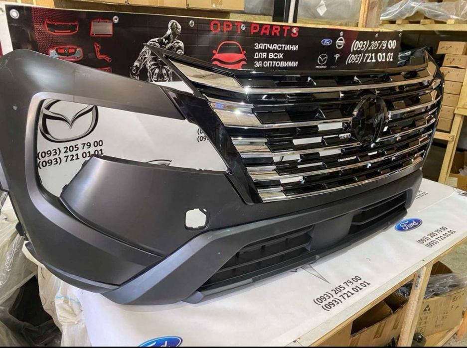 Бампер Nissan ROGUE T33 2024 2025 бампер рестайл в зборі решітка рог