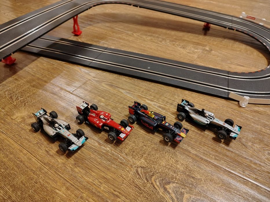 Автотрек Carrera GO!!! Champions F1 - Розширений Набір (4 Машинки, 6 П
