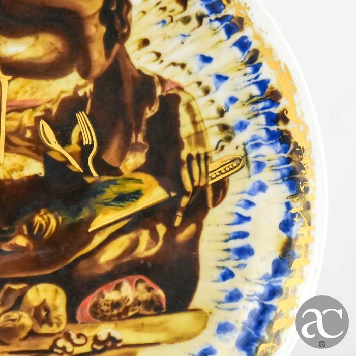 Prato Salvador Dalí em porcelana Rosenthal, pintado a ouro, assinado