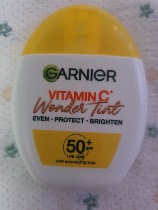 Сиворотка флюїд з вітаміном с та захистом spf 50