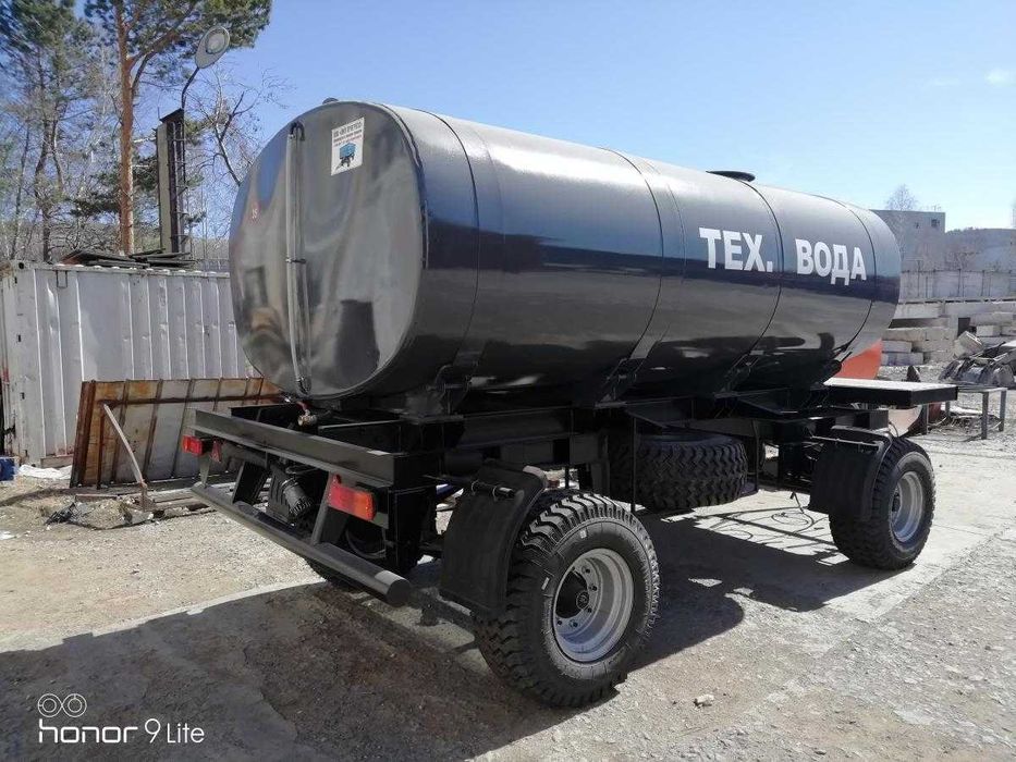 Прицеп для перевозки воды.