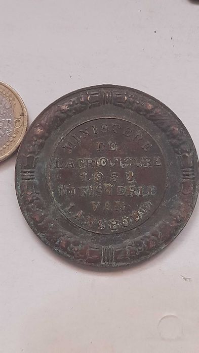 Medalha antiga interessante