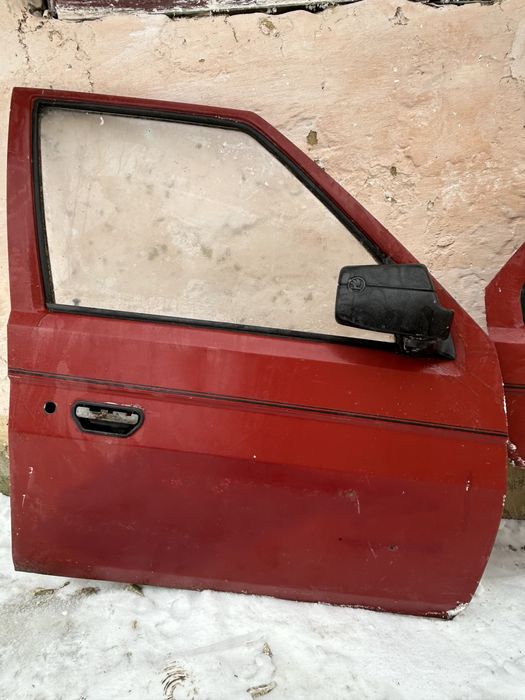 Двері шкода фаворит