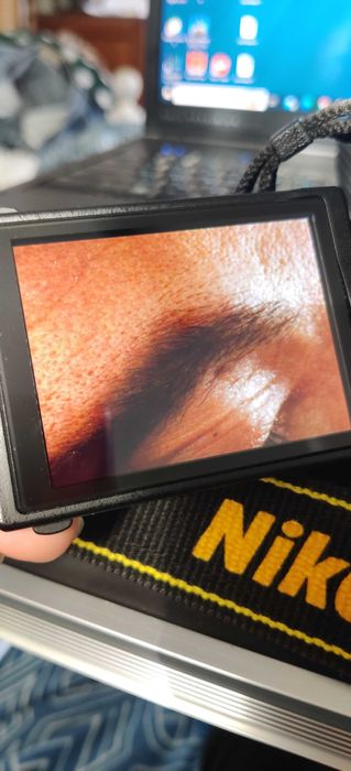 Nikon 5200, Lente, 2 baterias e uma mochila e mais coisas