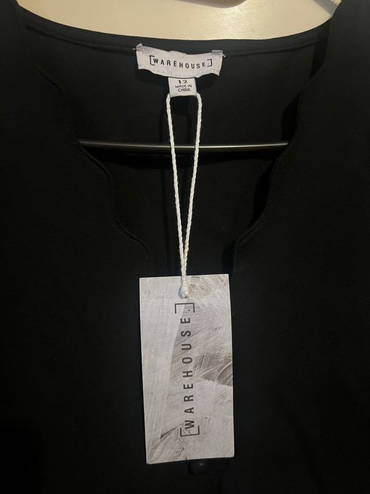 Чорна сукня фірми WARHOUSE