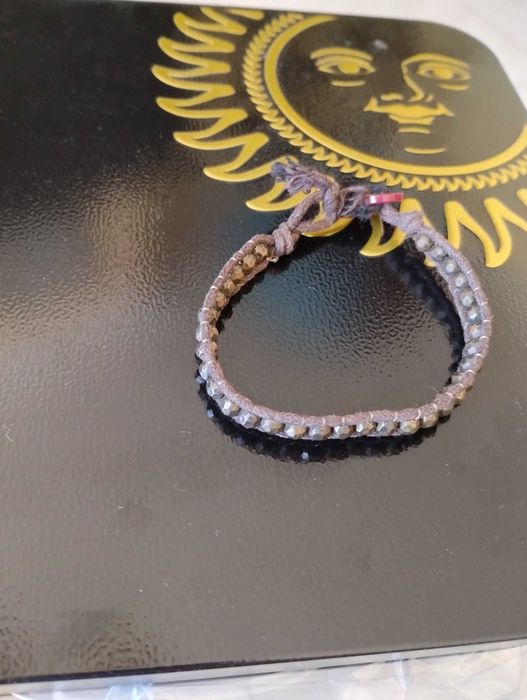 pulseira castanha dourada