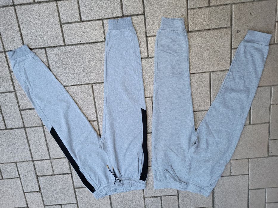 Zestaw dwóch par szarych spodni dresowych r. 158