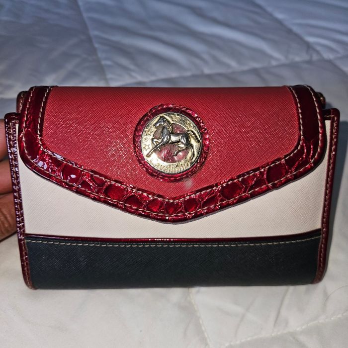 Vendo mochila + porta moedas cavalinho