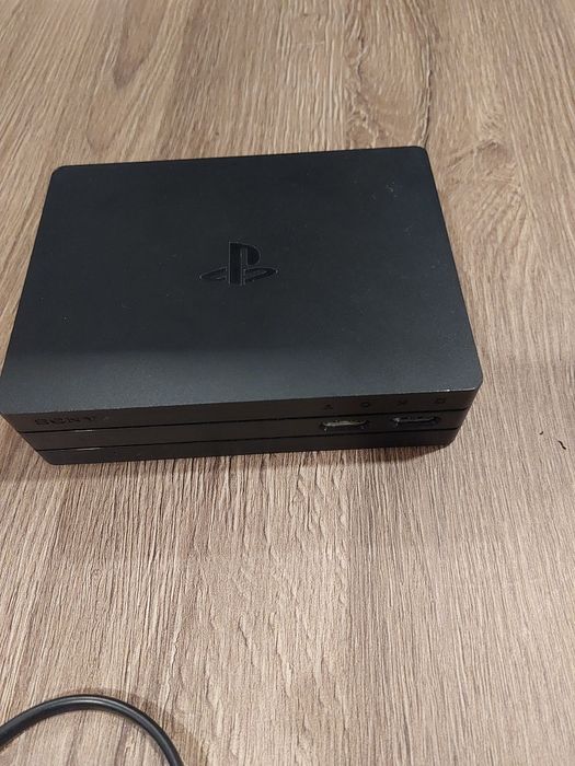 PlayStation 4 Pro 1TB + 2 Comandos DualShock – Excelente estado