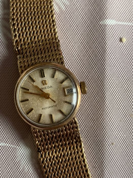 Годинник, золотий омега