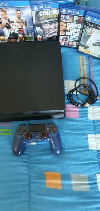 Ps4 slim 1Tb + 5 jogos