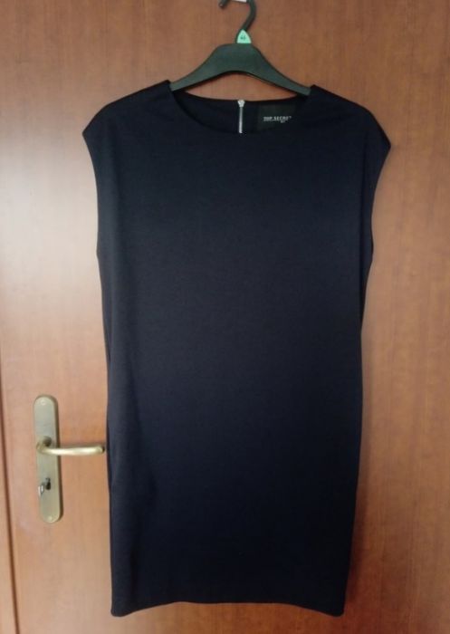 Elegancka sukienka z kieszeniami
