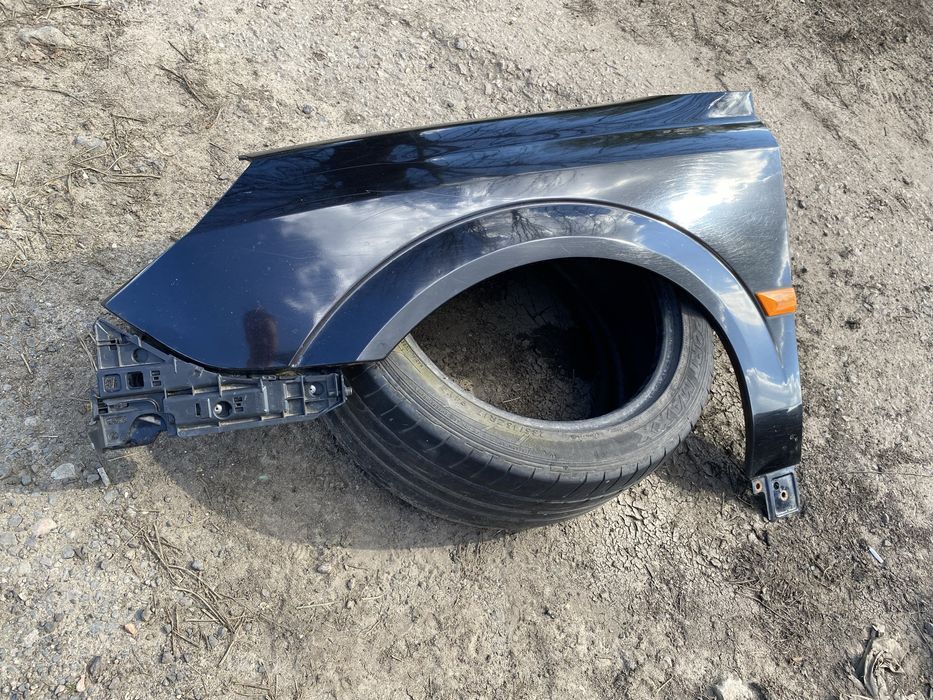 Opel Vectra C lift blotnik lewy przod Z20R
