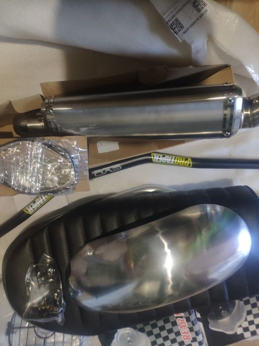 Віхлопна труба на мотоцикл кастом скремблер бобер крило сидіння