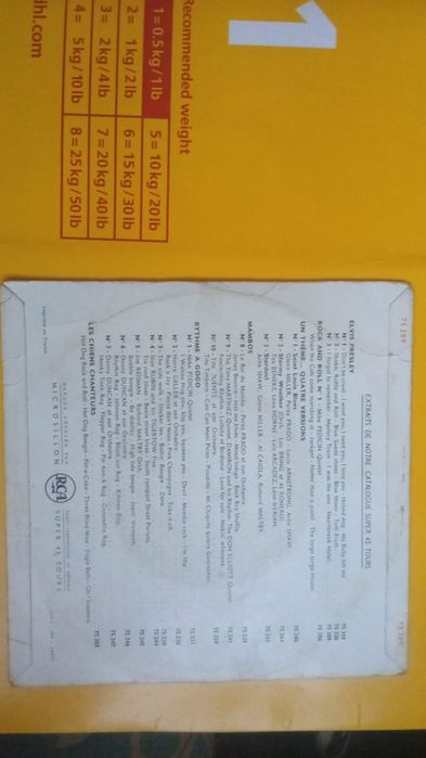 Disco vinil assinado por Elvis Presley.