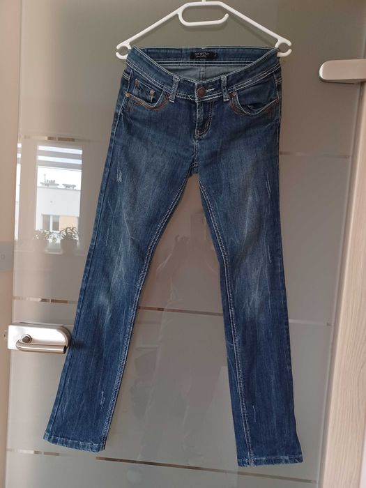 s14. Cudowne jeansowe Spodnie marki Top Secret rozmiar 36.