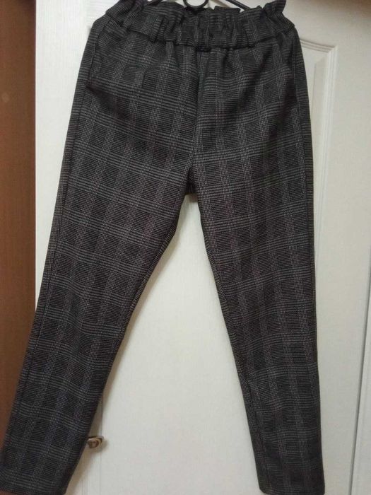 Штани теплі в клітинку