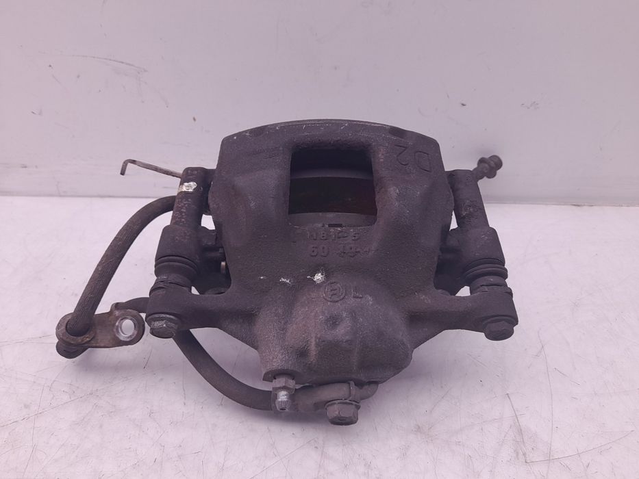 Pinça travão / maxila de travão frente esquerda TOYOTA Auris Touring S