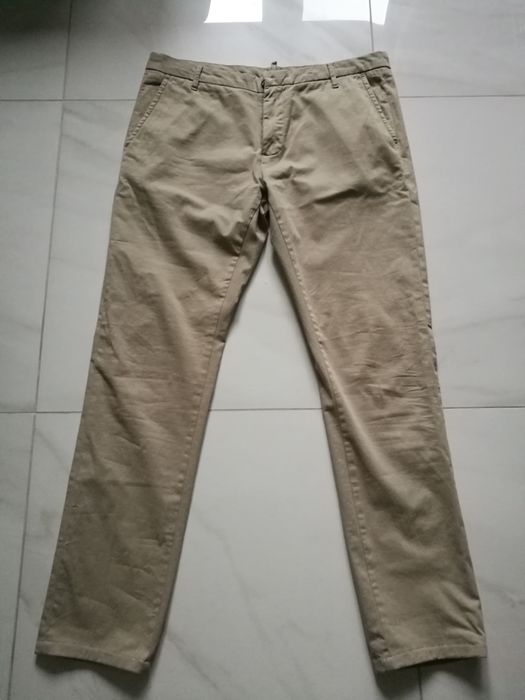 Spodnie Indywidual rozmiar 36W-32L, 97% bawełna. Slim fit.