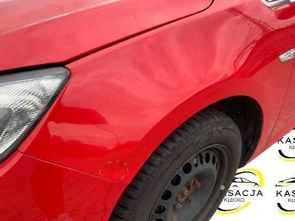 Błotnik lewy przód przedni Opel Astra J kolor z50b