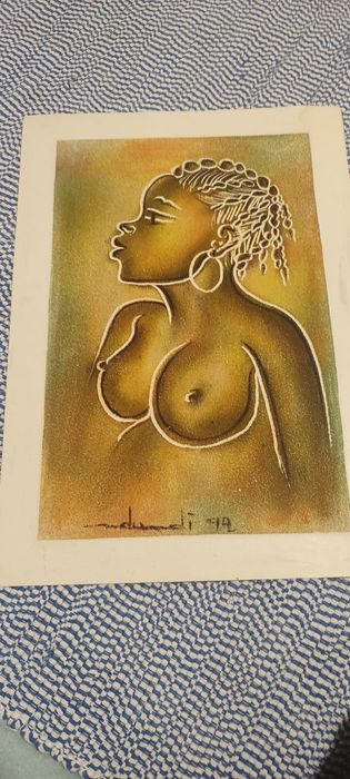 Arte angolana de 1942(44,92,94) feita com areia