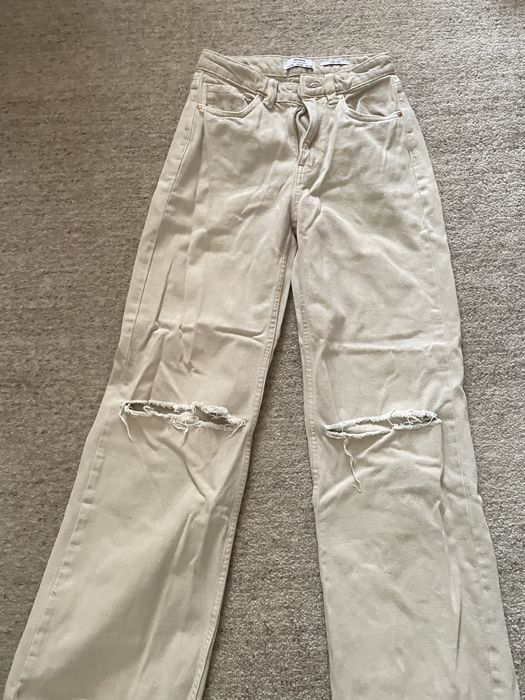 Джинси жіночі з дирками на колінах