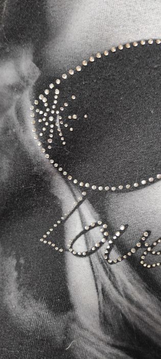 Sweterkowa damska bluza z kieszeniami i aplikacja jesien