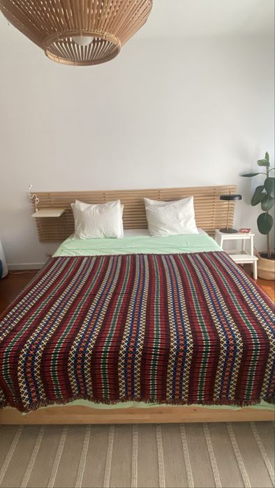 Cama de casal com arrumacao