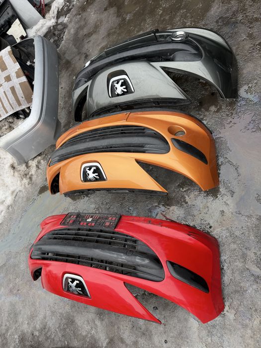 Бампер передній Peugeot 207