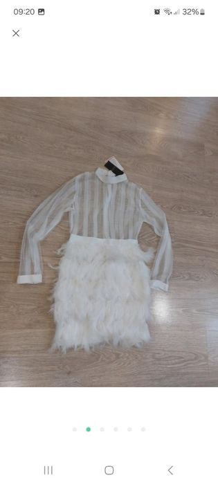 Святкова сукня з пір'ям