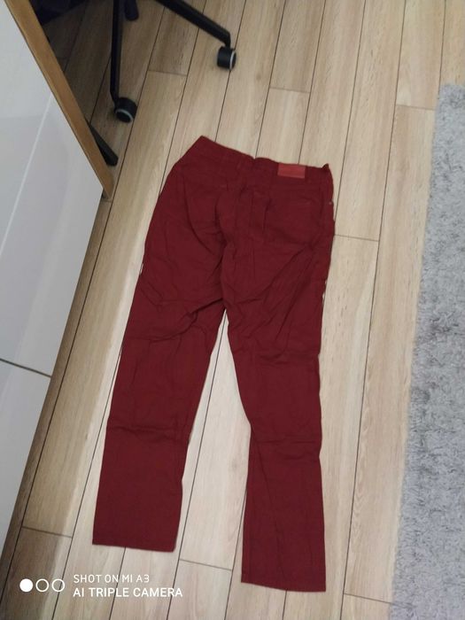Spodnie markowe Top Secret L/XL na sprzedaż stan bardzo dobry