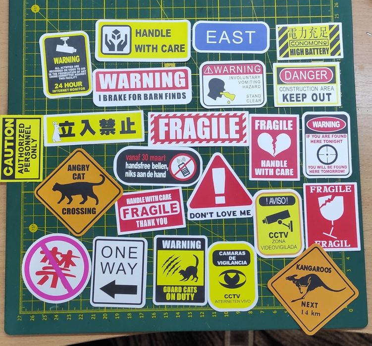 Наклейки попереджувальні знаки