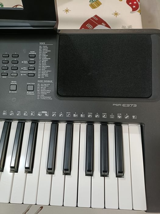 Piano elétrico portátil