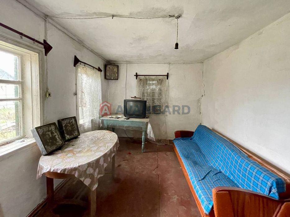 Ділянка 25 сотих з будинком в с. Худяки