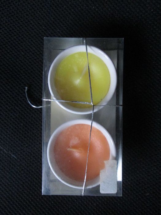 Velas perfumadas em recipiente de porcelana vidrada