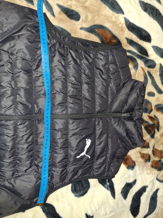 Чоловічий пуховий жилет