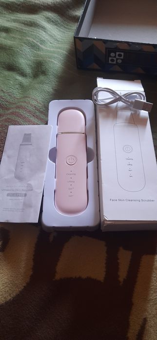 Ультразвуковой скрабер для лица.