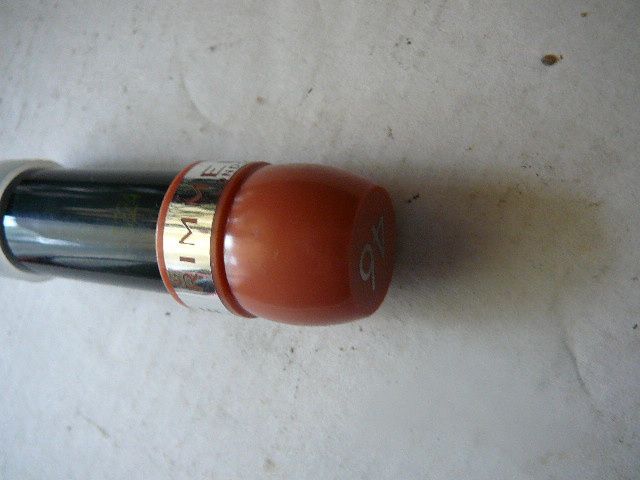 puder rozświetlający Impulse Body Shimmer ,szminka Rimmel +kosmetyczka