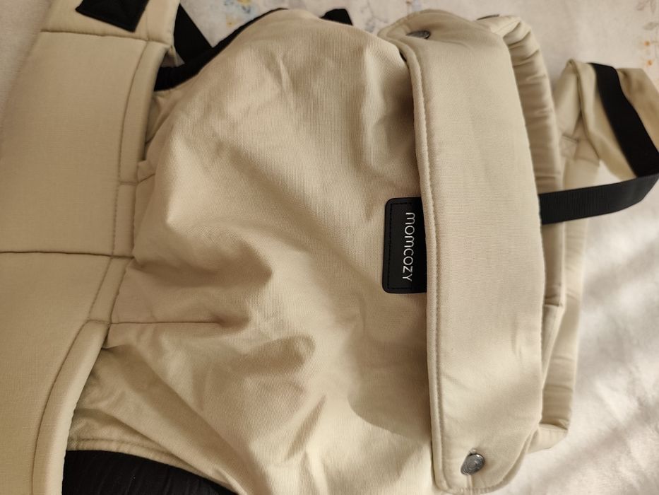 Momcozy porta-bebes Novo