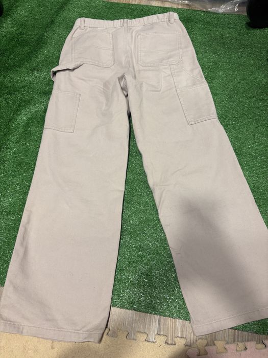 Облягаючі втягуючі кльош штани