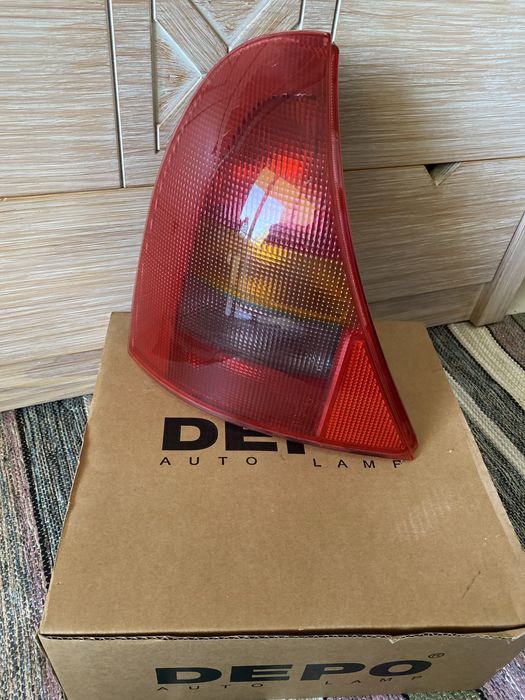 farolim esquerdo clio ll 2001