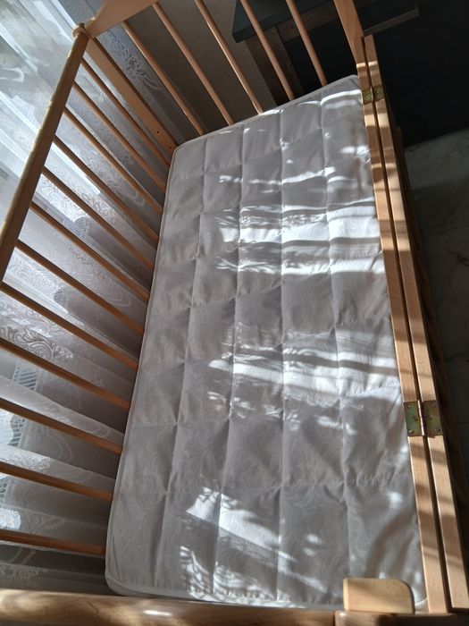 Дитяче ліжечко-колиска