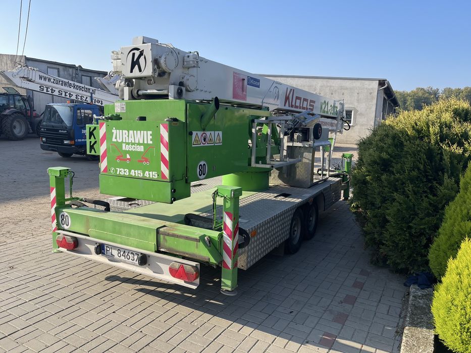 Żuraw Klaas K 21-31 TSH  z podestem roboczym.