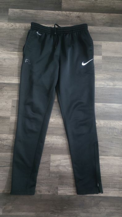 dresowe, treningowe spodnie NIKE dri -fit  z zamkami