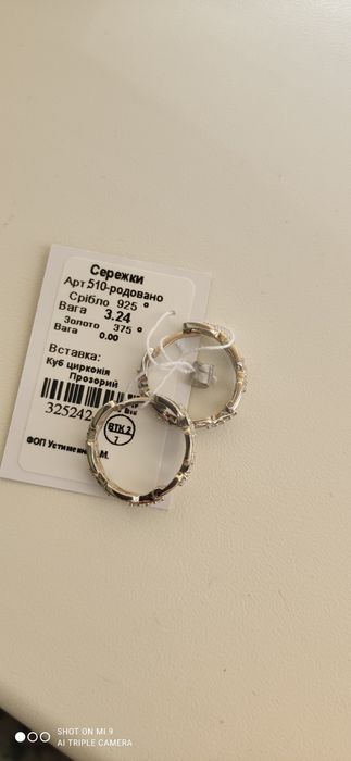 Продам нові срібні сережки кільця