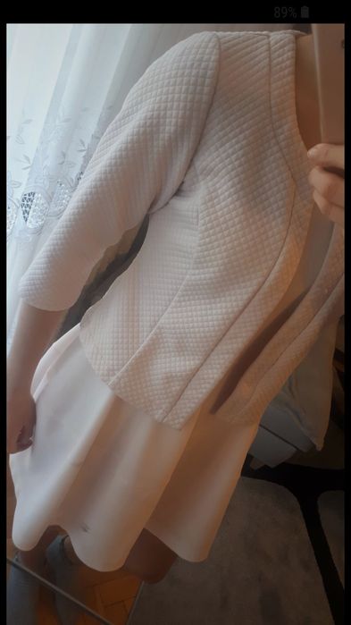 Elegacka, pudrowo-różowa narzutka damska