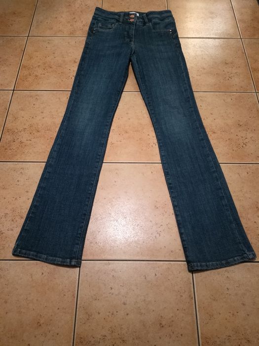 Spodnie dzwony dżinsowe, bootcut high rise. Rozmiar M. Push up.