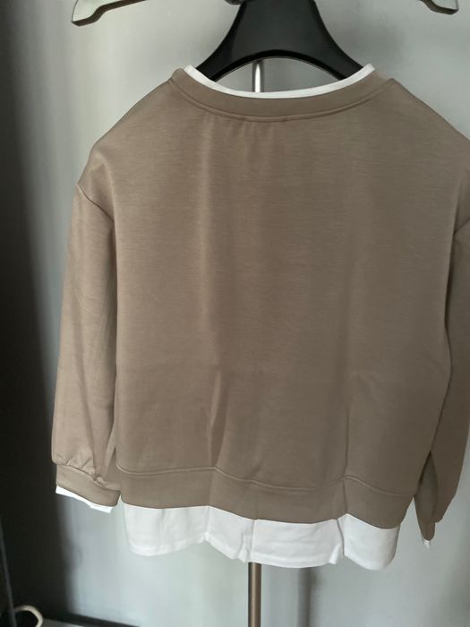 Beżowa bluza z białymi wypustkami