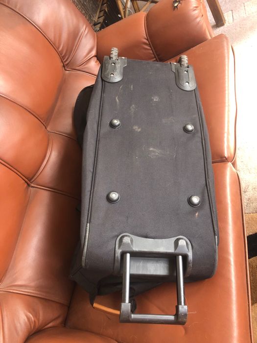 Trailer com rodas ou saco viagem mala