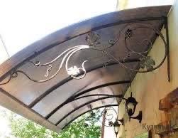 Кований дашок над вхідними або над балконом. Арковий без покриття